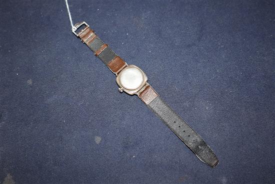 A gentlemans silver Rolex Oyster cushion cased wristwatch, with silvered Roman dial and